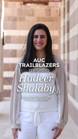 A woman is standing and smiling. Tet: AUC Trailblazer featuring Hadeer Shalaby '`11, Managing Director of Talabat Egypt