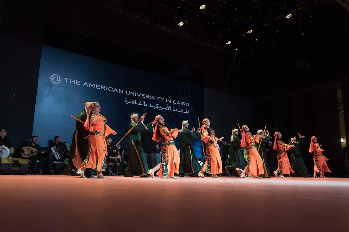 AUC students dancing during international day celebration