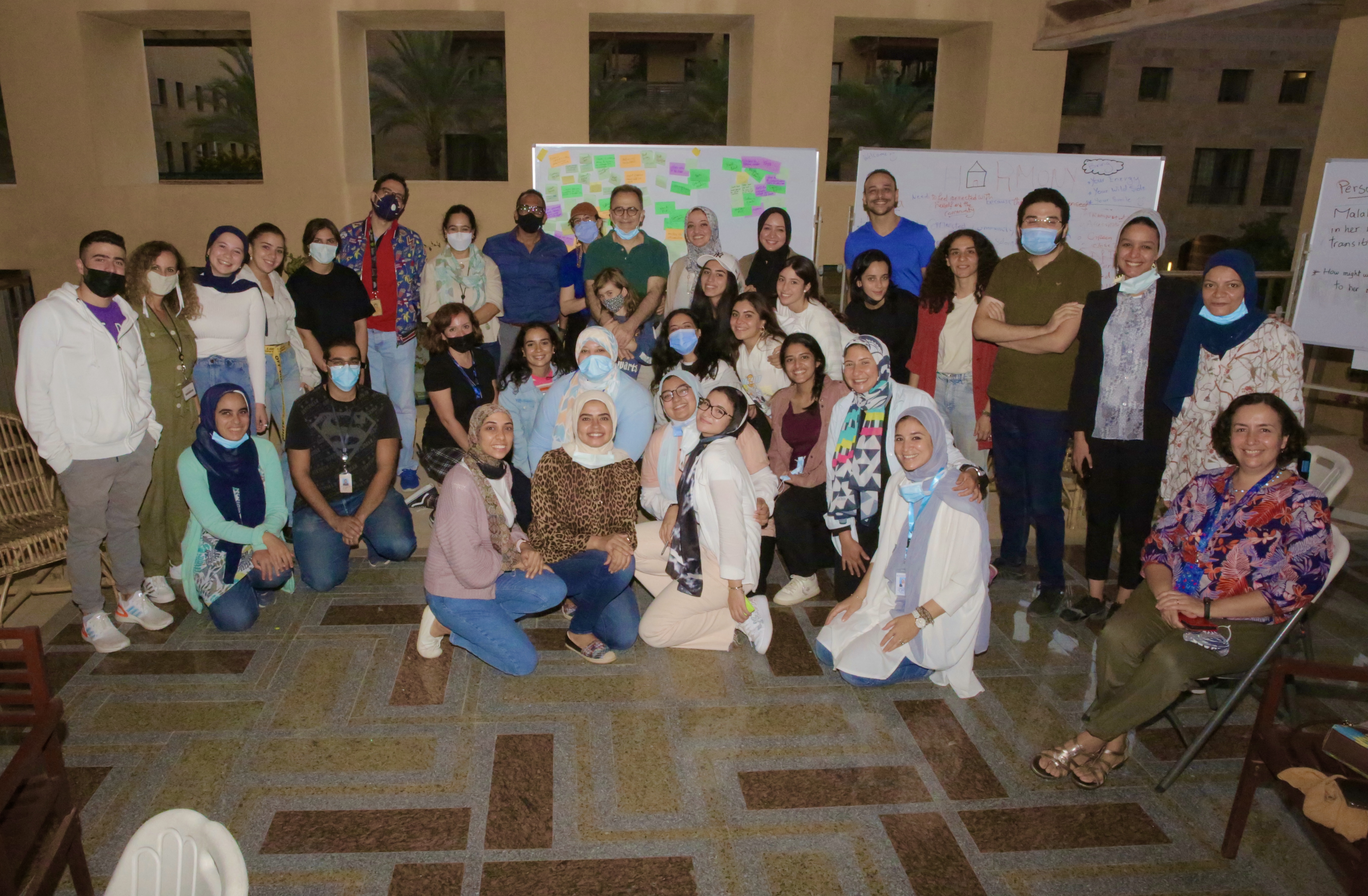 Group of students with AUC President Ahmad Dallal