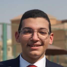 Boy wearing glasses smiling