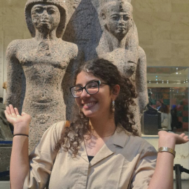 Girl with glasses smiling