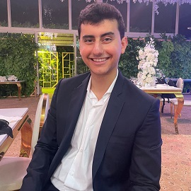 Boy with suit smiling