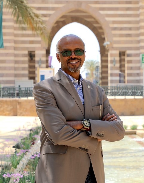 Man with suit smiling