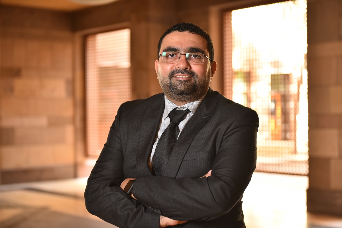 Man with suit smiling