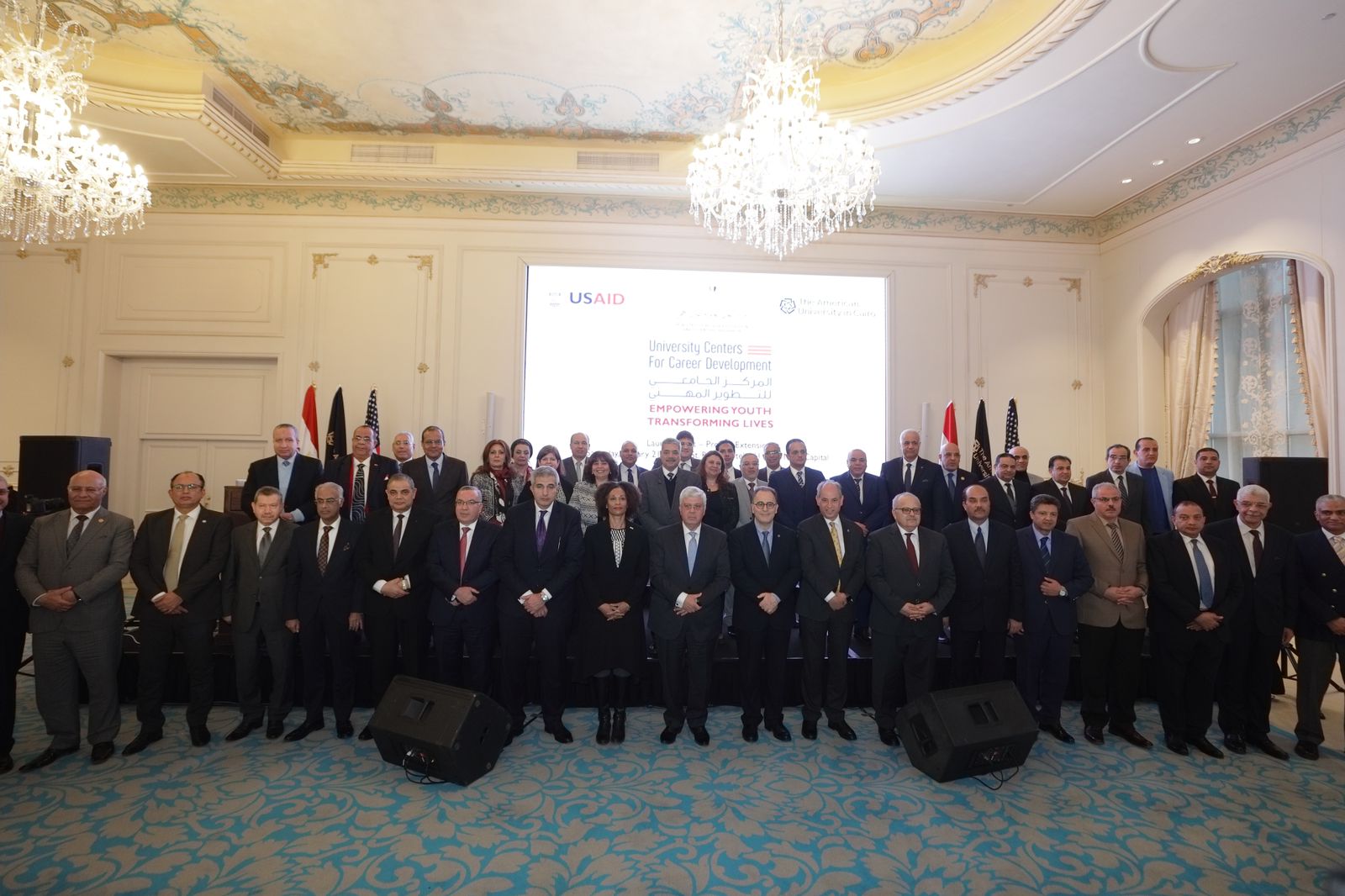 Group picture of men and women in formal wear