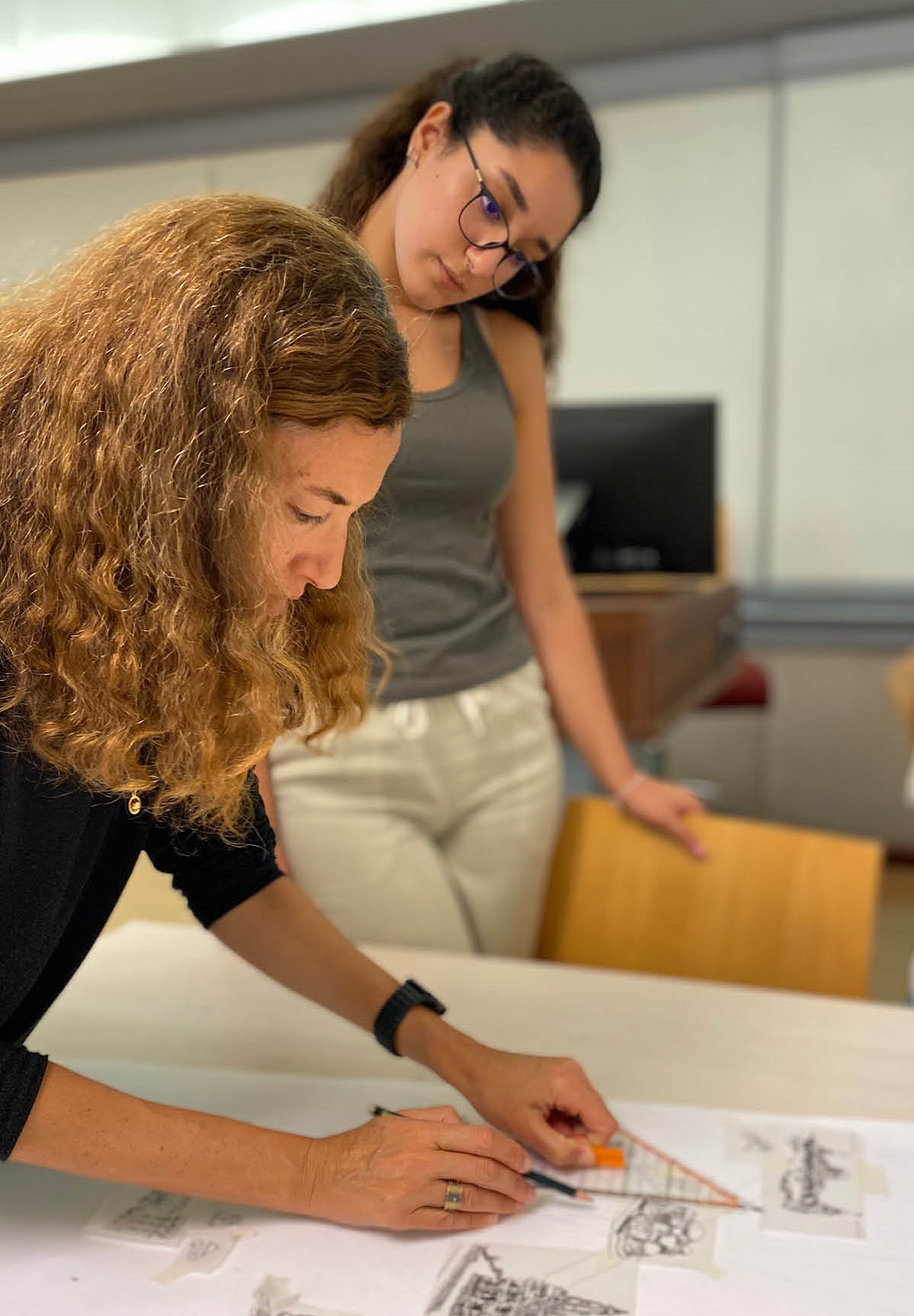 auc student with professor in class