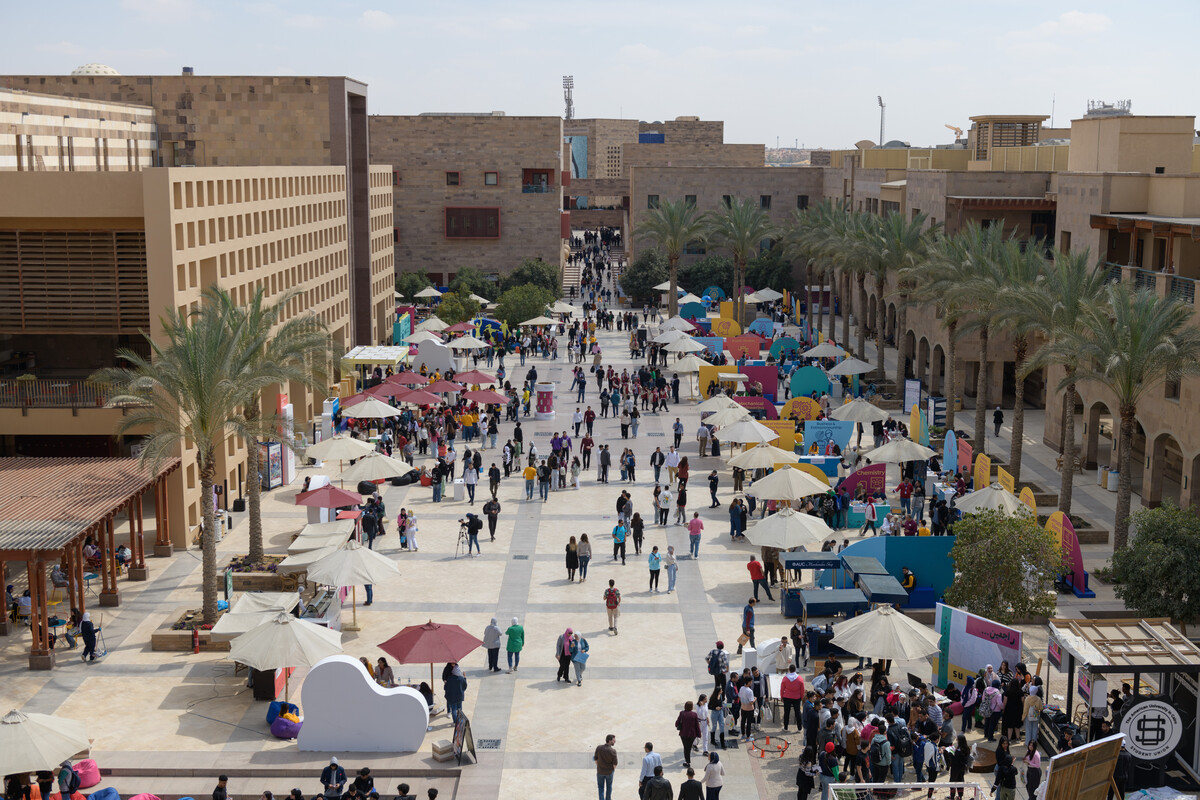People walking in the plaza