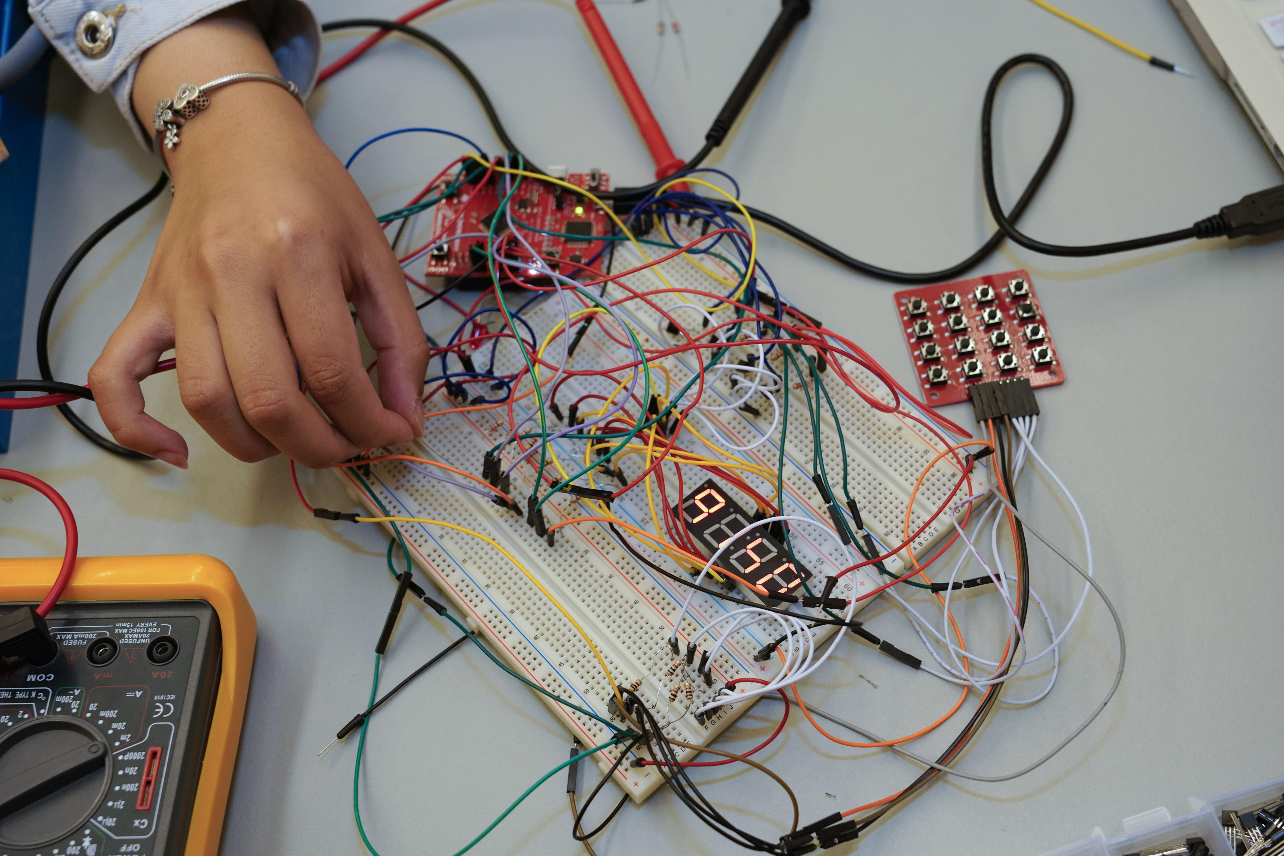 up close view of student working with electrical eqiupment