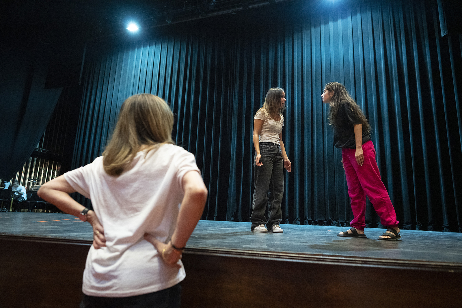 student acting practice performance on stage