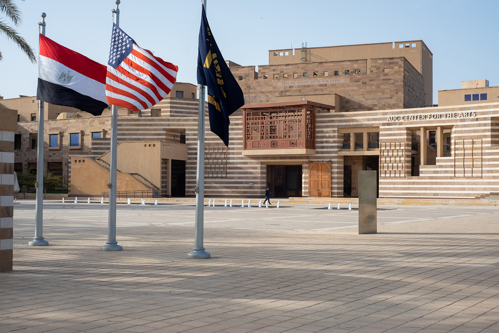 Flag of AUC, USA and Egypt on AUC campus
