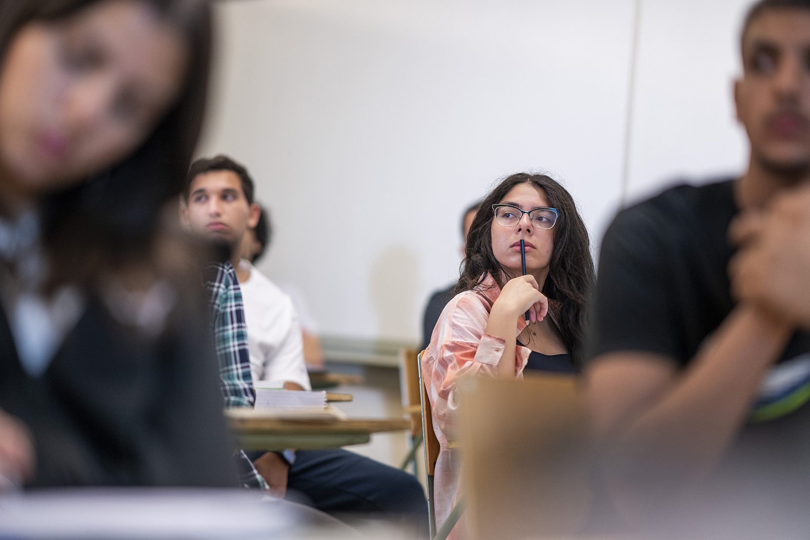 A gril in class thinking