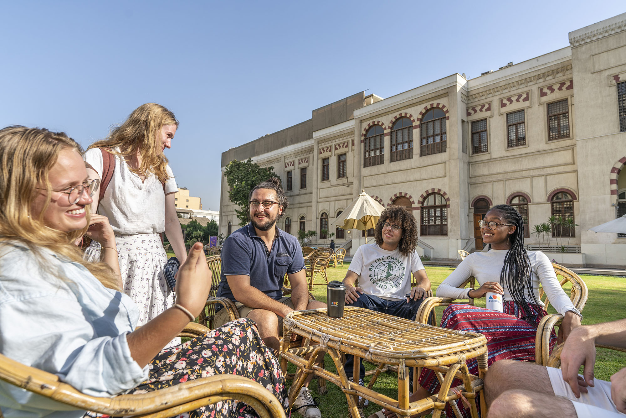 International human rights law program image of group of international students in tahrir campus garden talking