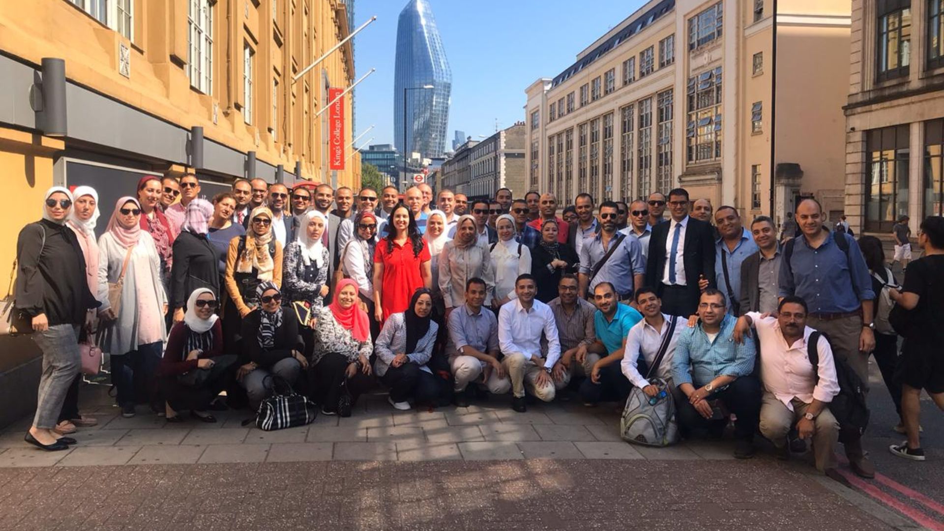 Members of the LEP program pose in a street