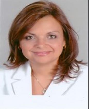 a faculty member Jasmine Fouad wearing white