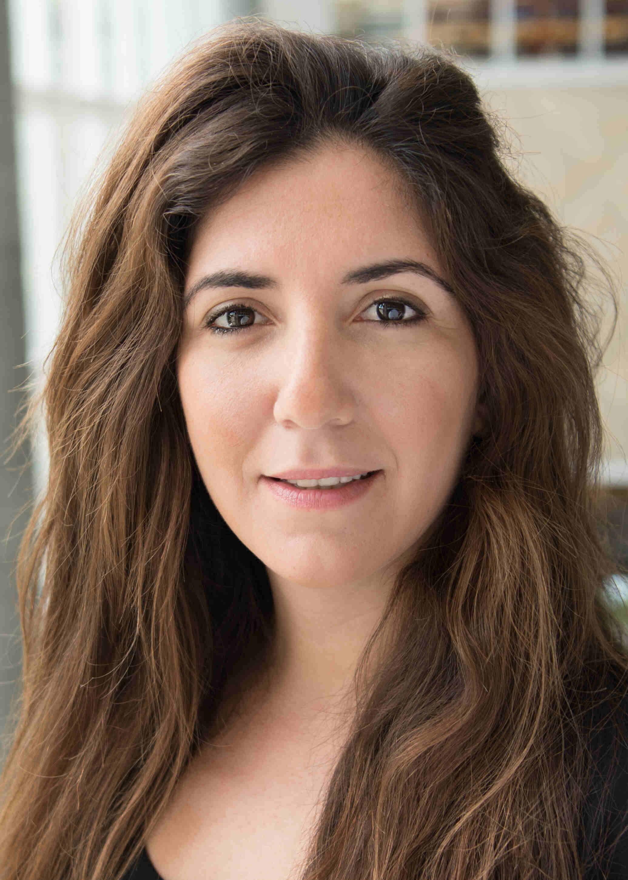 Headshot of a lady smiling