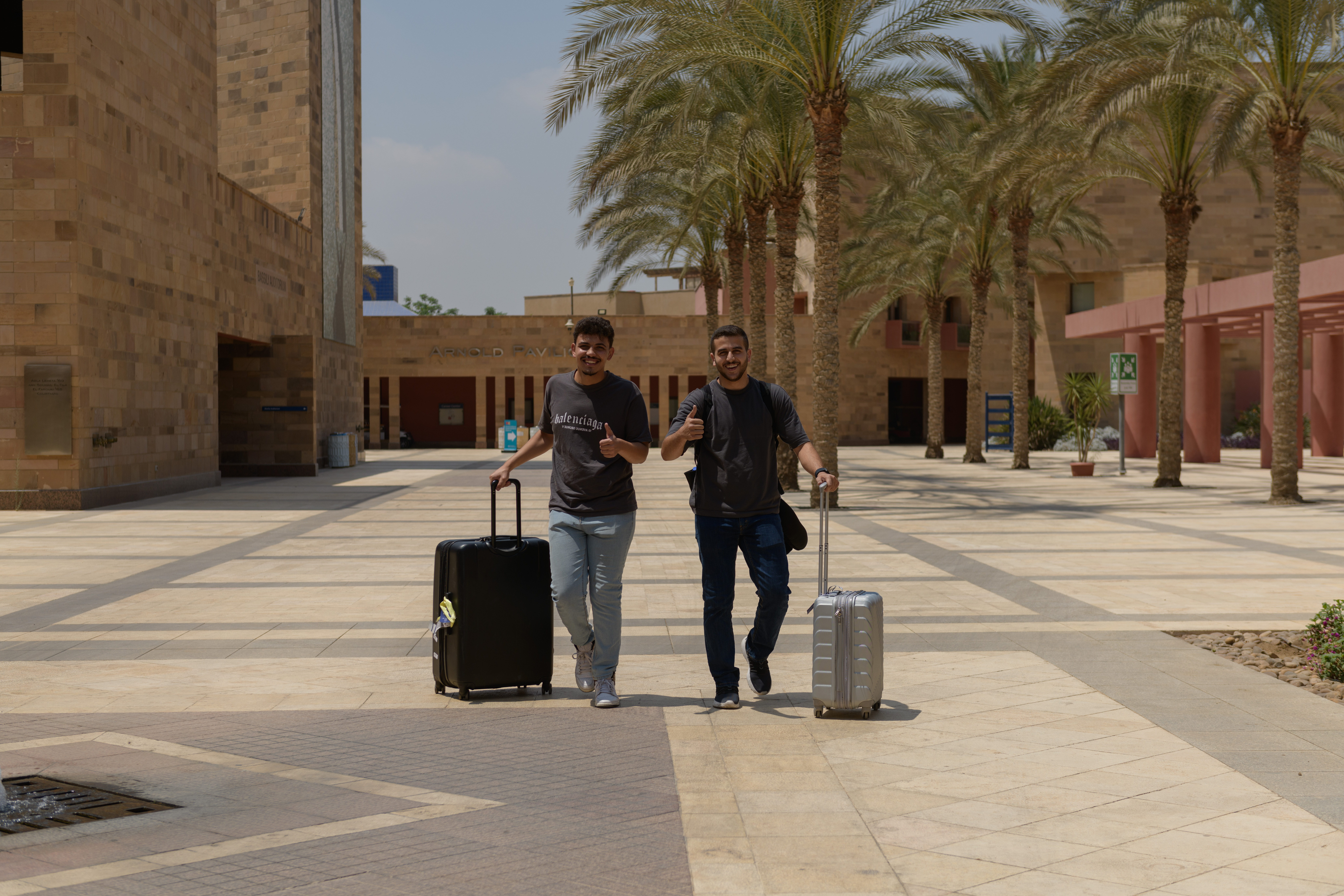 male students checking in