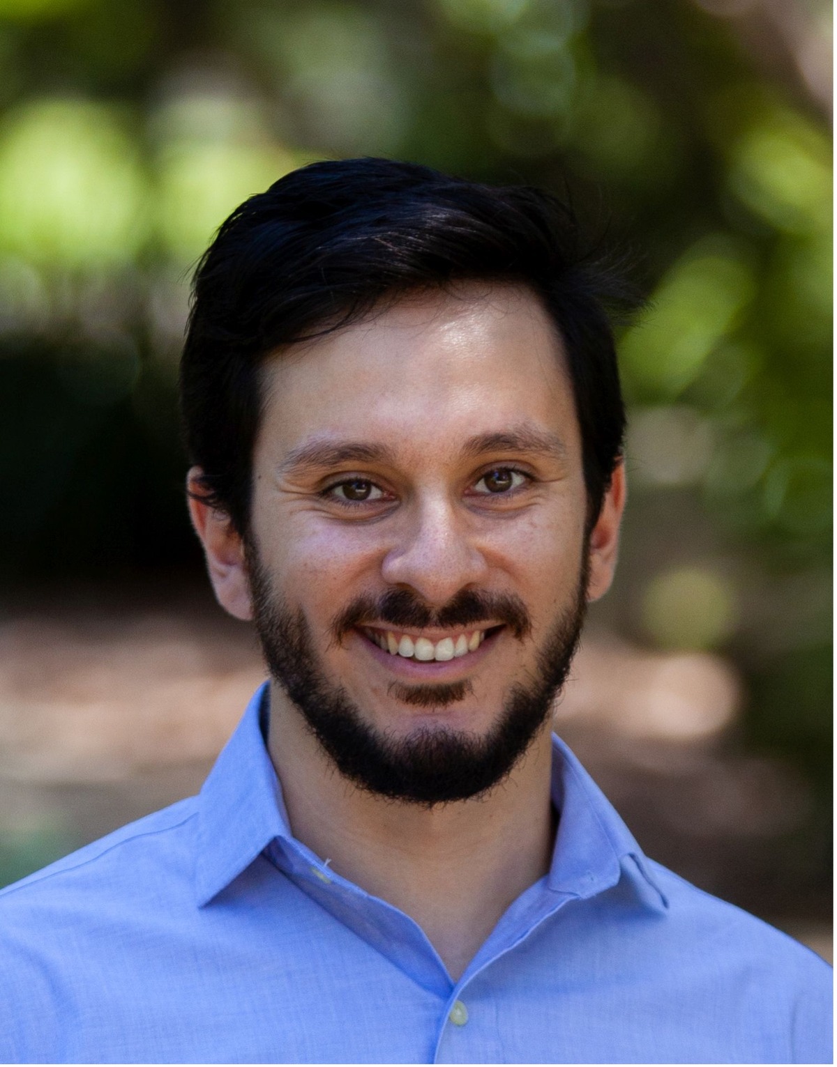 Headshot of a man smiling