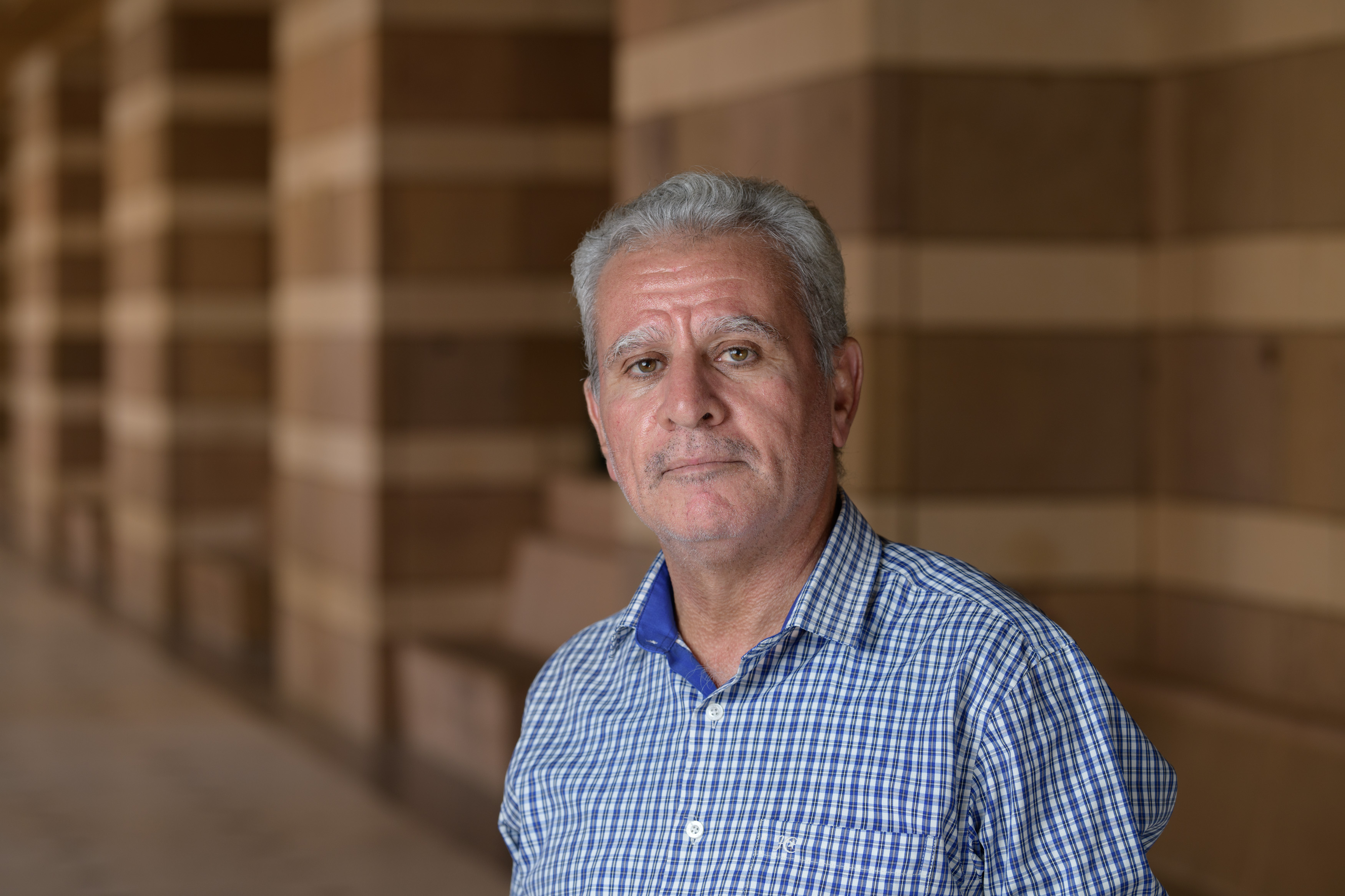 headshot of a man smiling
