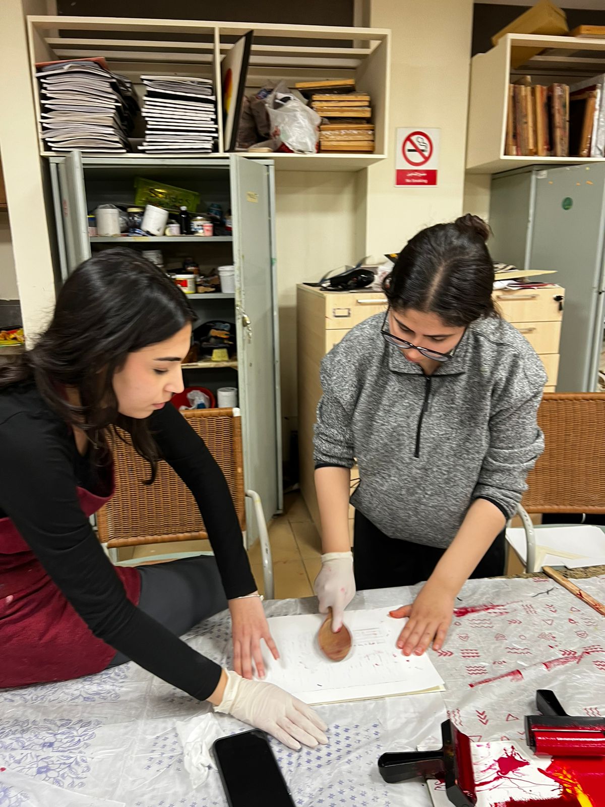 girls working with rubber stamp