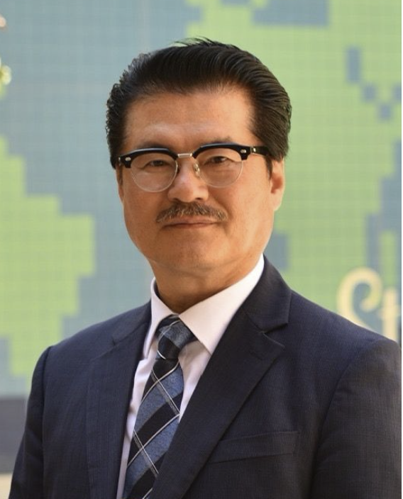 Headshot of a man smiling