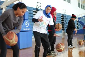 Students playing basketball