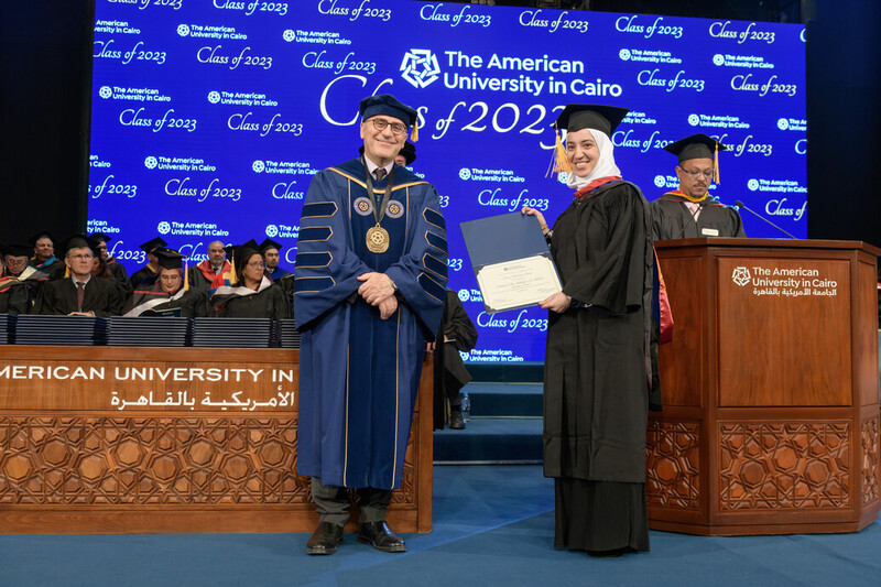 Menna accepts the Mohammed Bin Abdulkarim Elehedan Graduate Award
