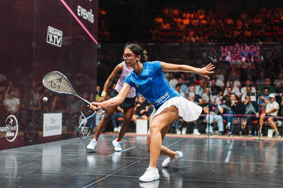 Amina Orfi plays squash