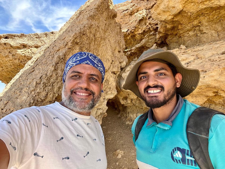 Selfie of two Egyptian researchers at a historic site