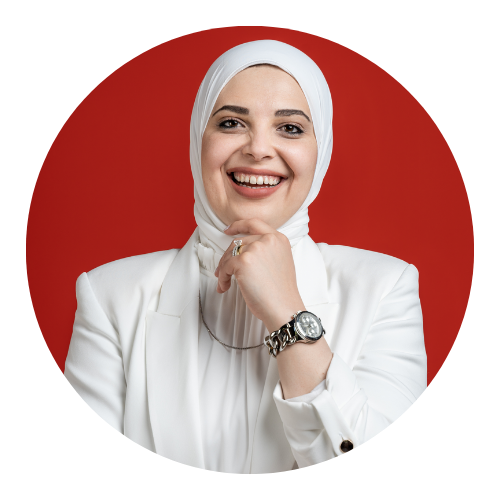 Woman in white hijab and white suit jacket smile