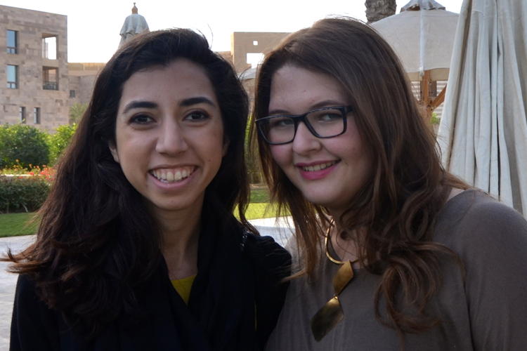 two girls smiling