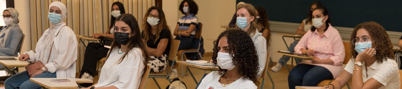 Students wearing masks in AUC class