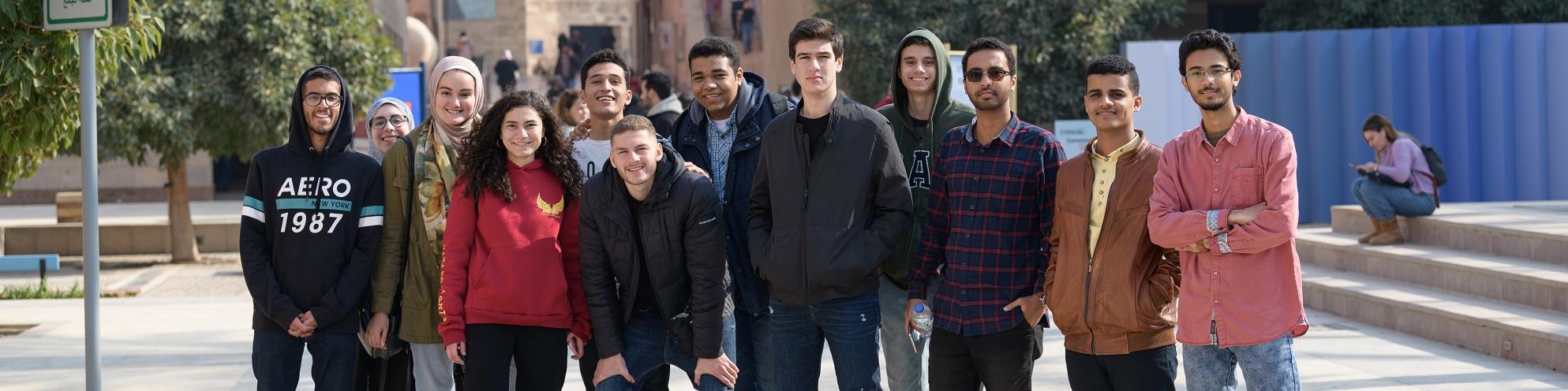 Group of girls and boys on AUC campus