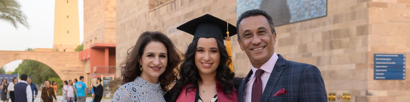 Graduate student with her parents