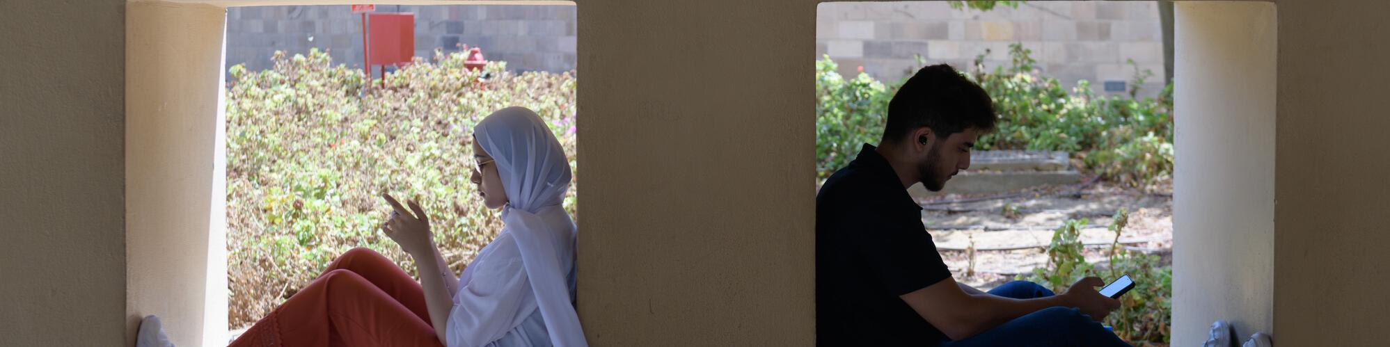 Two students reading