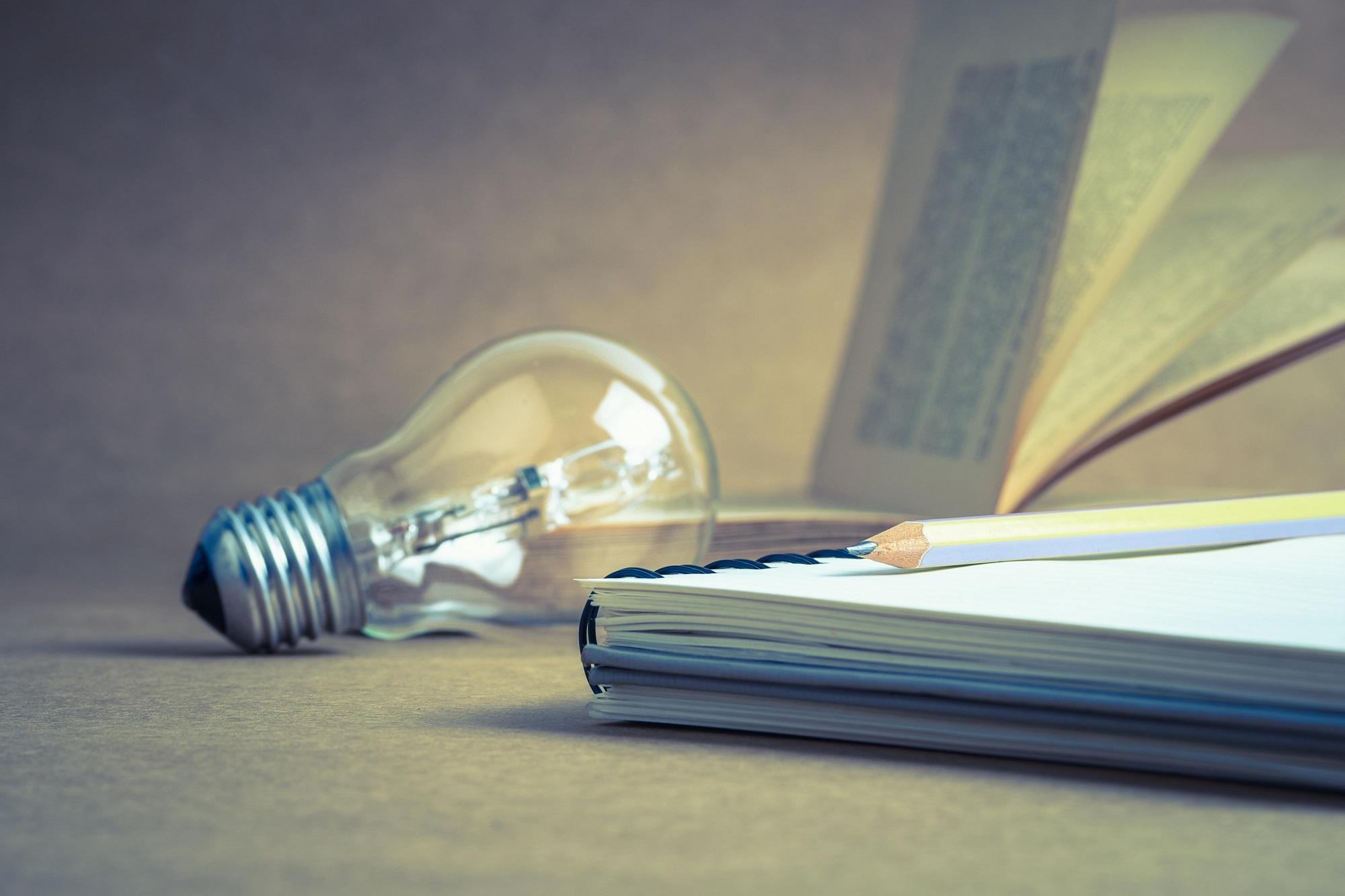 light bulb beside an open book