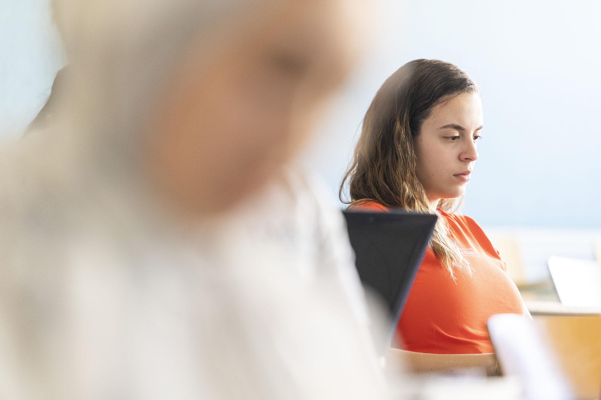 A girl sitting in class