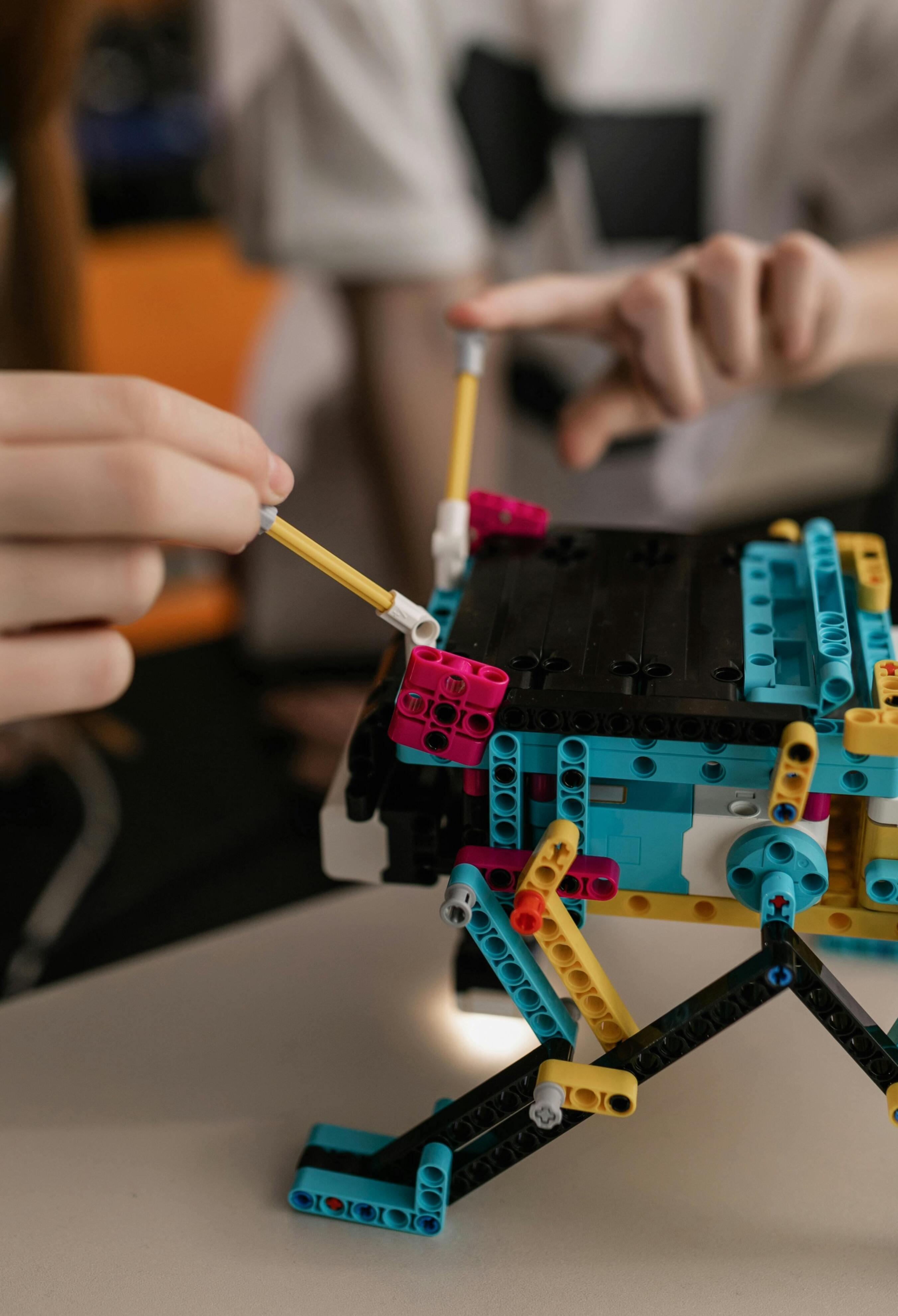 Kids with lego robot