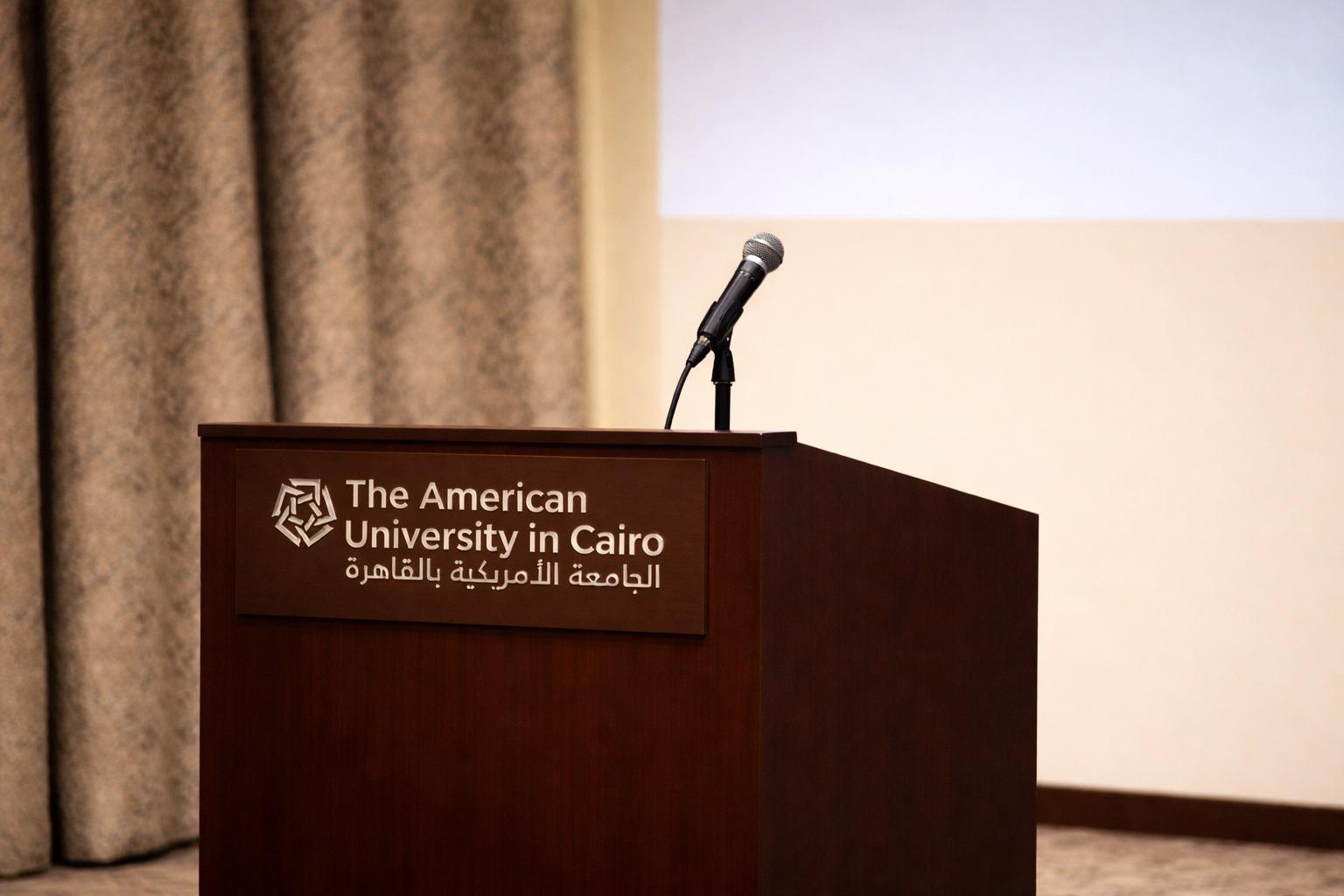 a mic on a podium and behind it a curtain