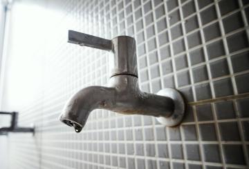 Water tap representing water scarcity in climate change