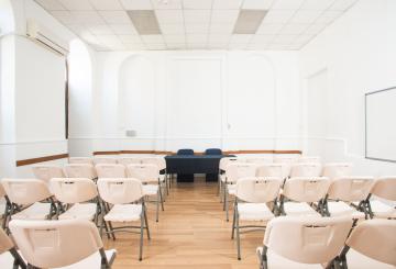Chairs in a room and a table