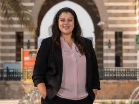 lady wearing formal smiling