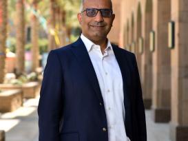 Man with suit smiling