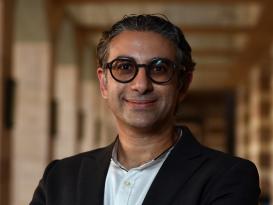 Man with suit smiling