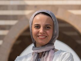 veiled girl smiling