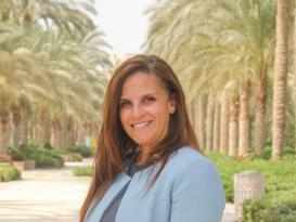 A woman with a blue blazer jacket