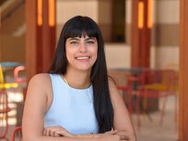 Yara Zidan sitting at a table