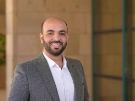 Ahmed Gowida in a suit