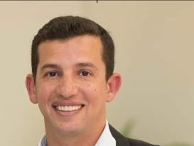 A man is smiling