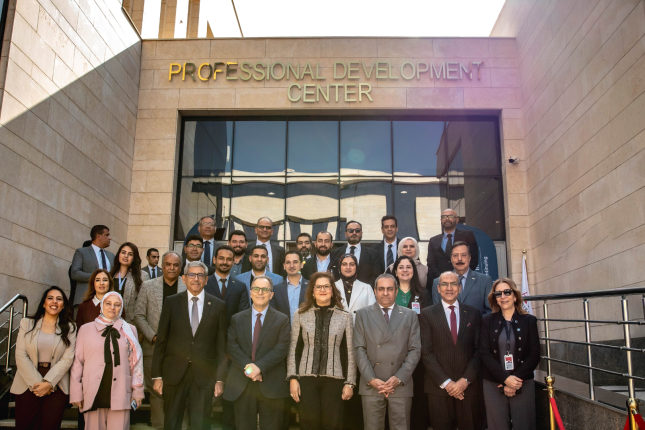 administrators standing in front of new professional development center