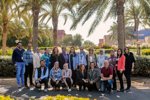 Group of people posing in the AUC Gardens